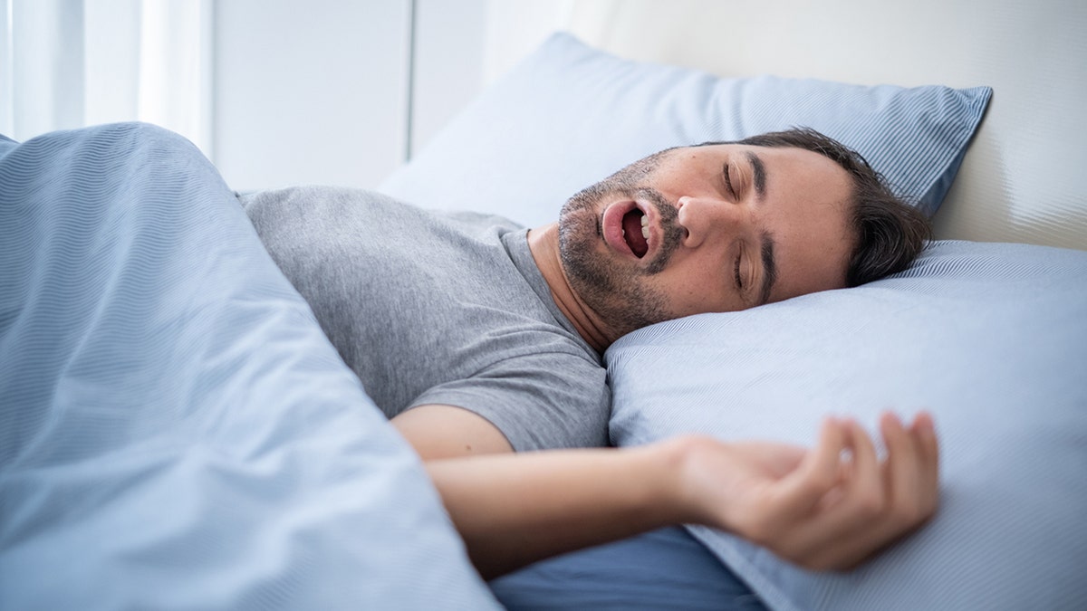 The hoarse man while sleeping